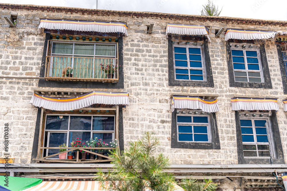 Fototapeta premium Traditional Tibetan windows decorated with different ornaments