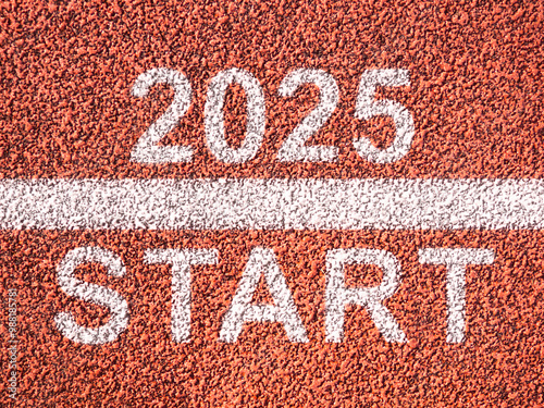 New year 2025 concept. Inscription start on asphalt. Road for runners with numbers 2025. Motivational new year banner. Metaphor for start competition in 2025. Motivational holiday template. 3d image