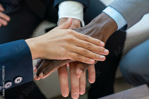 Wallpaper Mural Close-Up of Multiracial Hands Stacked in Teamwork Gesture Torontodigital.ca