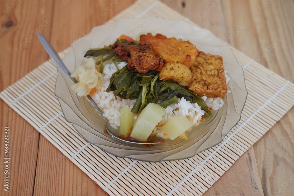Nutritious plate of food featuring rice and assorted vegetables, a balanced and delicious dish Nutritious plate of food featuring rice and assorted vegetables, a balanced and delicious dish