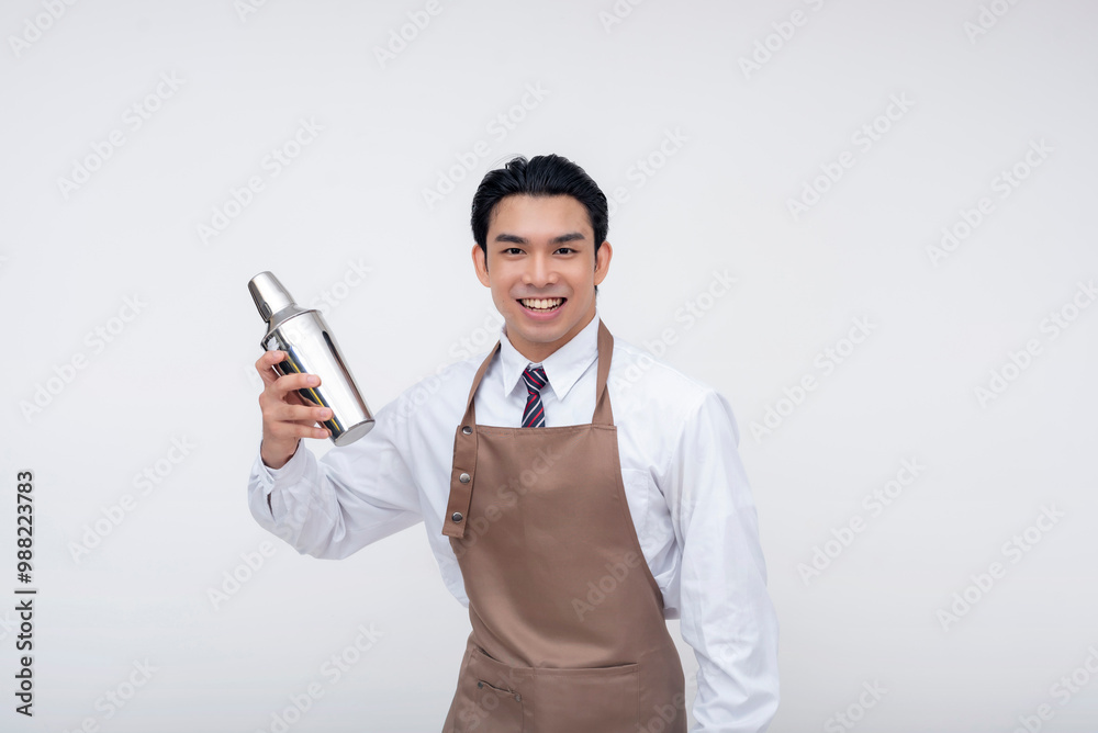 An Asian bartender smiling while mixing a cocktail using a shaker. The image is set against a white background, conveying professionalism and hospitality. An Asian bartender smiling while mixing a cocktail using a shaker. The image is set against a white background, conveying professionalism and hospitality.