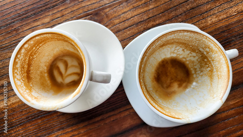 Top view latte art coffee on wood background