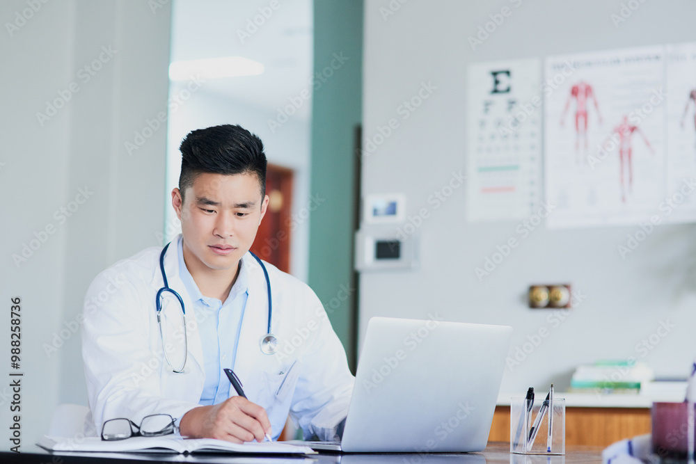 Hospital, man and laptop with documents in office for medical research, information and treatment. Healthcare, doctors and writing with tech at desk for client records, telehealth or diagnosis update Hospital, man and laptop with documents in office for medical research, information and treatment. Healthcare, doctors and writing with tech at desk for client records, telehealth or diagnosis update