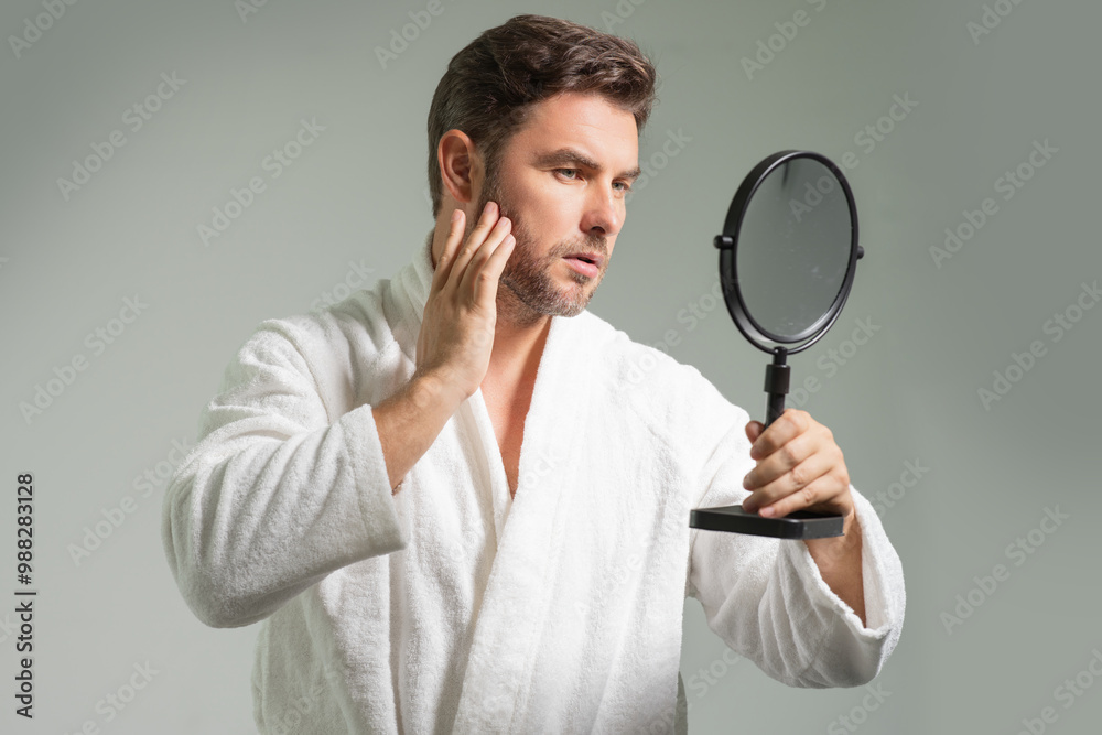 Mens beauty. Cream treatment for mens face. Beauty routine. Face of a beauty man with perfect skin. Anti-aging and wrinkle cream. Concept of male beauty. Male skincare cosmetics concept. Skin care. Mens beauty. Cream treatment for mens face. Beauty routine. Face of a beauty man with perfect skin. Anti-aging and wrinkle cream. Concept of male beauty. Male skincare cosmetics concept. Skin care.