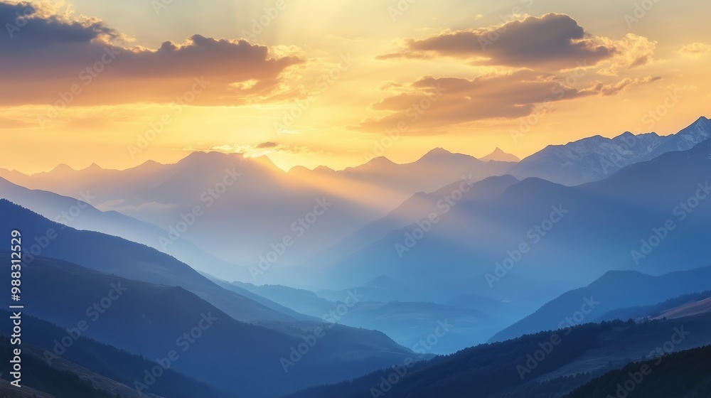 Sunrise over mountain ranges with a vivid sky and soft light illuminating the peaks in early morning tranquility Sunrise over mountain ranges with a vivid sky and soft light illuminating the peaks in early morning tranquility