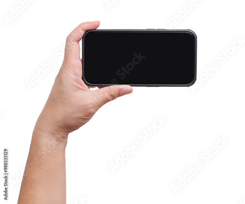 A hand holding a mockup smartphone with empty transparent screen in horizon landscape view. Background cutout.