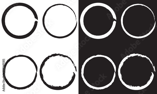Grunge circles brush set. Black and white circle frames. Round line of black paint. Grunge round shapes. Circular ink brush stroke fro design elements. Isolated on white and black background. EPS 10. 