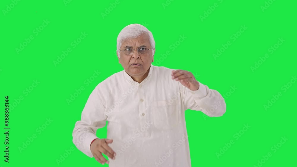 Confused Indian old man looking and finding someone Green screen Confused Indian old man looking and finding someone Green screen