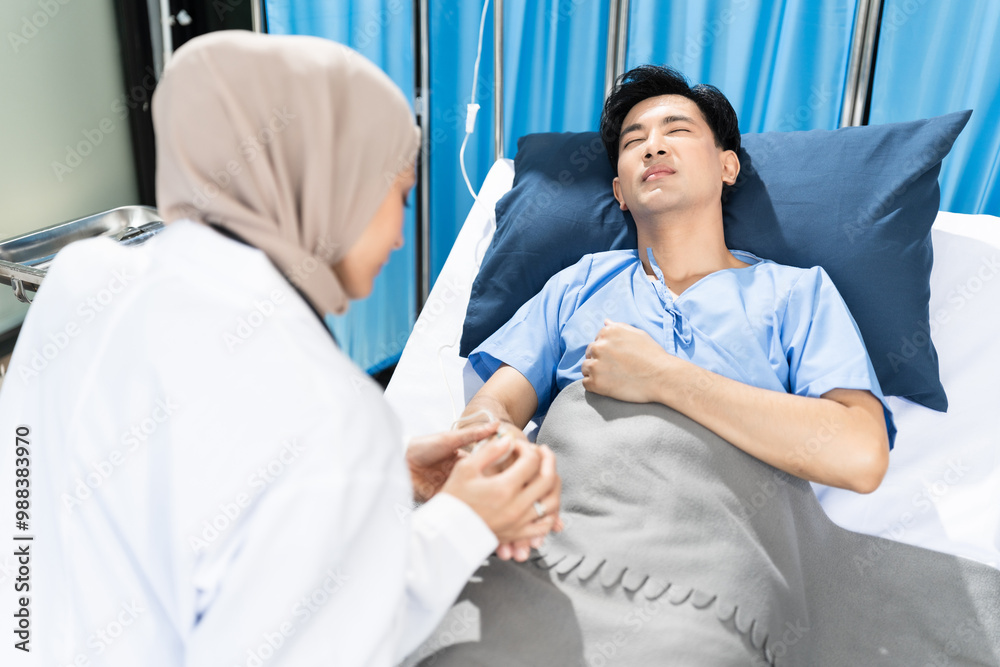 healthcare and people concept - doctor talking to male patient at bed in hospital. healthcare and people concept - doctor talking to male patient at bed in hospital.