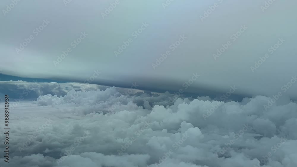Impressive POV flying through a massive storm clouds as seen from an airplane cockpit avoiding storms. Immersive pilot’s perspective. 4K 60FPS Impressive POV flying through a massive storm clouds as seen from an airplane cockpit avoiding storms. Immersive pilot’s perspective. 4K 60FPS