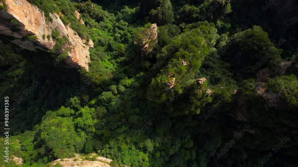 Top down aerial shot of Zhangjiajie mountains rocky formation, Avatar landscape Top down aerial shot of Zhangjiajie mountains rocky formation, Avatar landscape