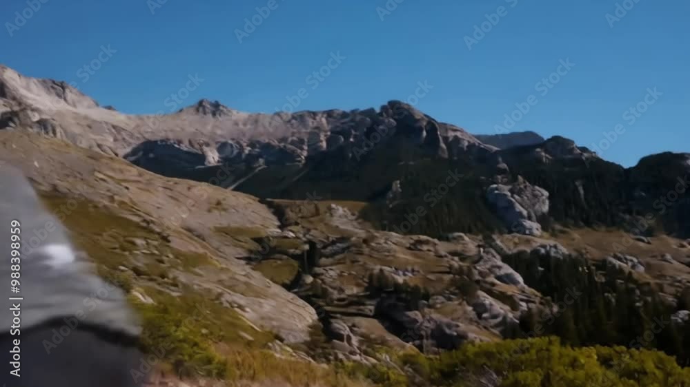 The Cyclist Conquering a Mountain Trail - 4K The Cyclist Conquering a Mountain Trail - 4K