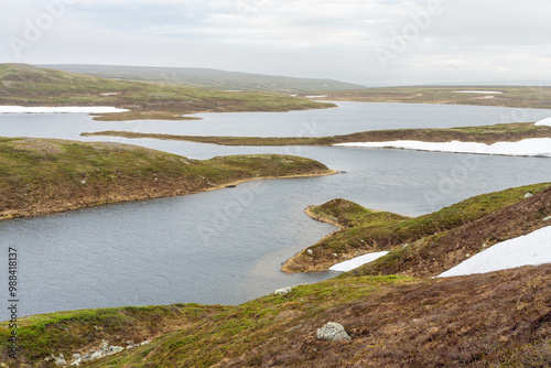 A lake in the highlands of the Varanger Peninsula on a mid summer day, Pettervannet, Vadsø, Finnmark photo