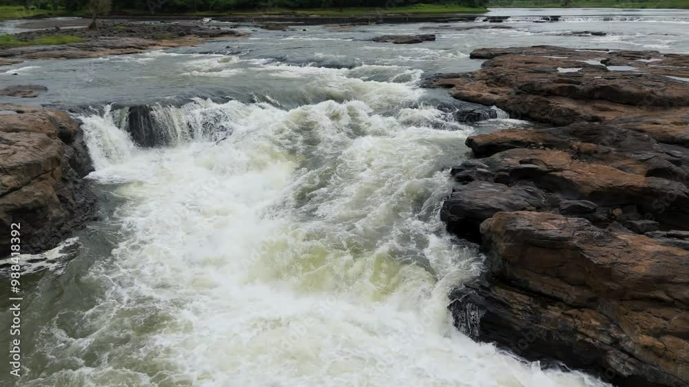 Aerial view of River flow near the cliffs. Beautiful aerial view of river flow through the rock. Aerial view of River flow near the cliffs. Beautiful aerial view of river flow through the rock.