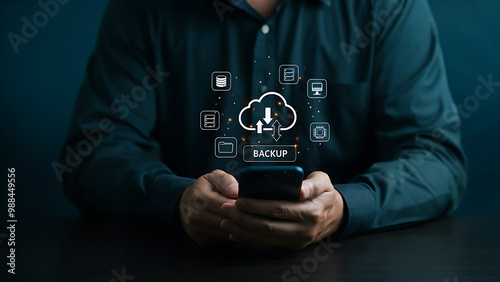 Backup storage data technology concept. Person use smartphone with virtual backup icons for backup online documentation database and digital file storage system or software,file access, doc sharing.