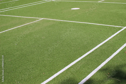 tennis court covered with artificial grass close up