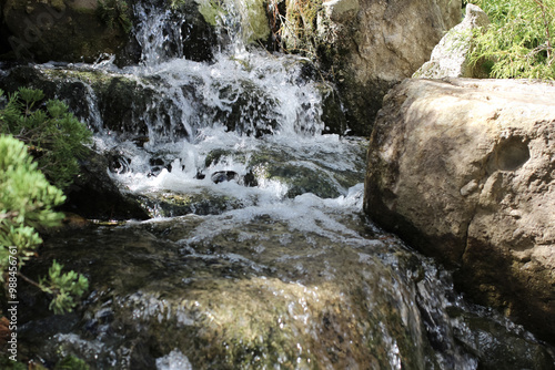 water fall flowing between rocks close up