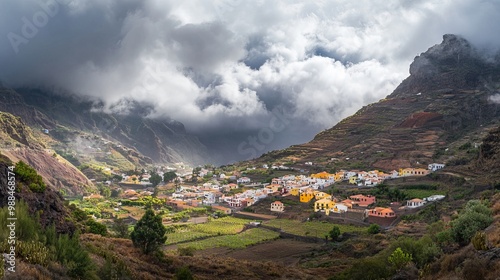 Panoramic view of the center of Vallehermoso in La Gomera, with the cloudy Cumbre de Chijere and Buenavista in the background photo