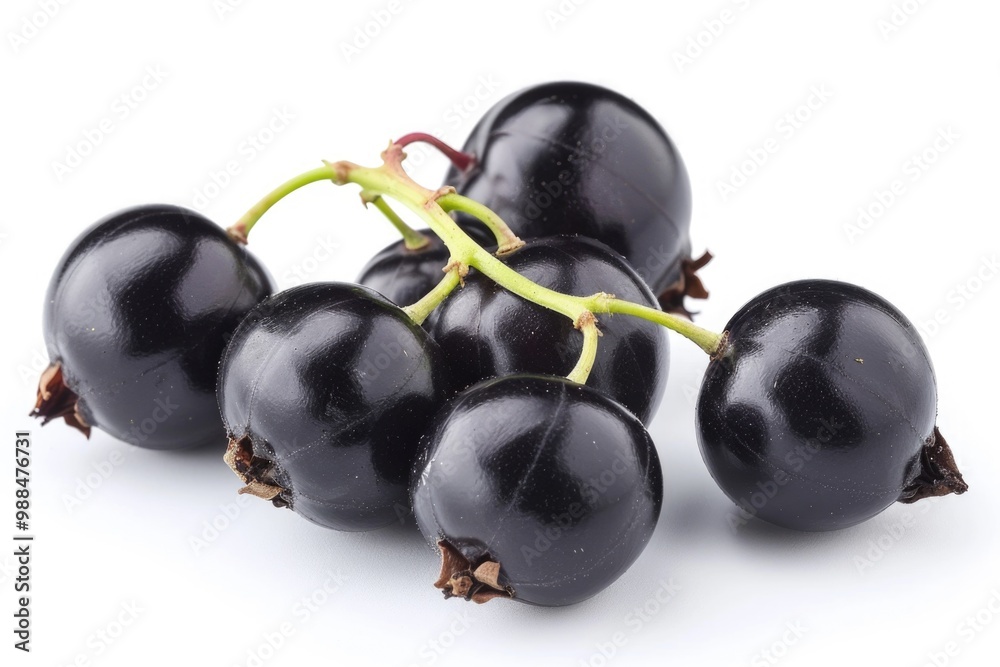 Fresh black cherries arranged on a clean white surface, ideal for food or still life photography Fresh black cherries arranged on a clean white surface, ideal for food or still life photography