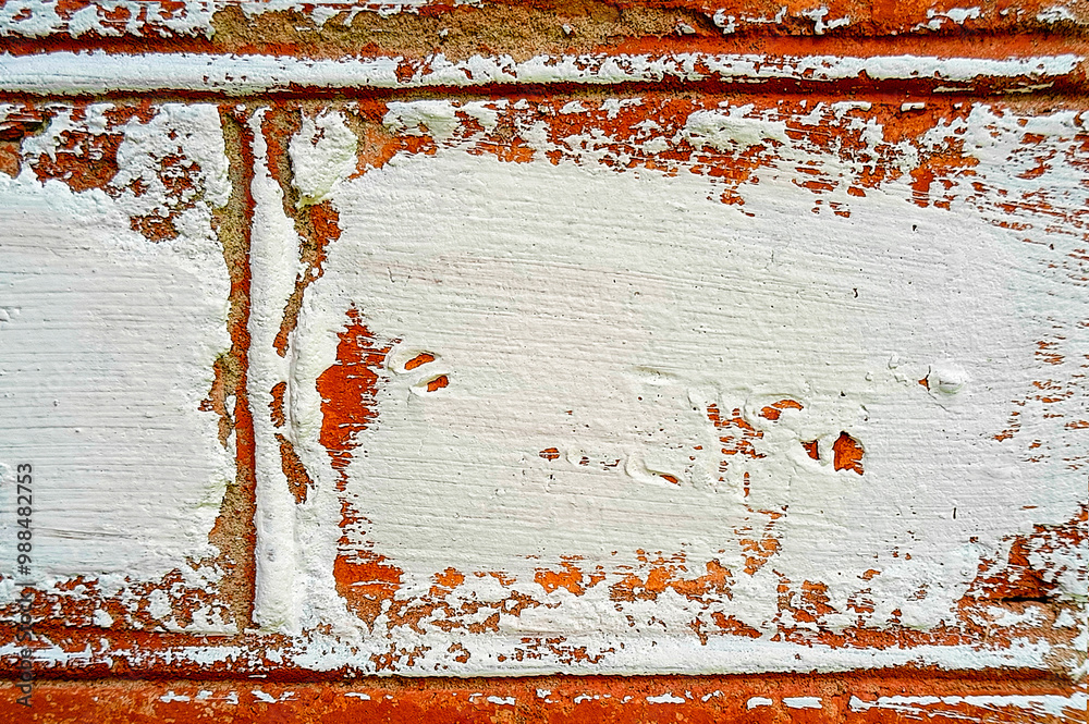 Fototapeta premium painted brick surface, paints colors. Colorful grunge texture of wall close-up