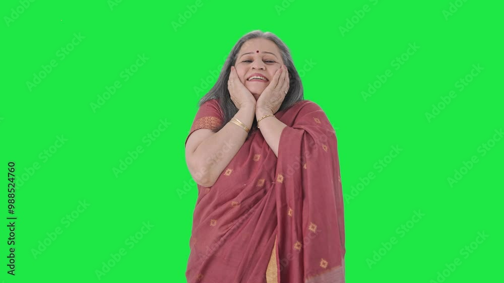 Happy Indian old woman getting a surprise Green screen Happy Indian old woman getting a surprise Green screen