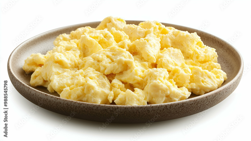 A plate of soft, fluffy scrambled eggs, cooked to perfection with a creamy texture. A classic breakfast dish that is simple yet satisfying. A plate of soft, fluffy scrambled eggs, cooked to perfection with a creamy texture. A classic breakfast dish that is simple yet satisfying.