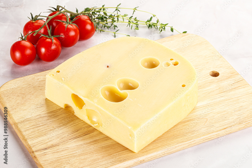Maasdam cheese brick over board Maasdam cheese brick over board
