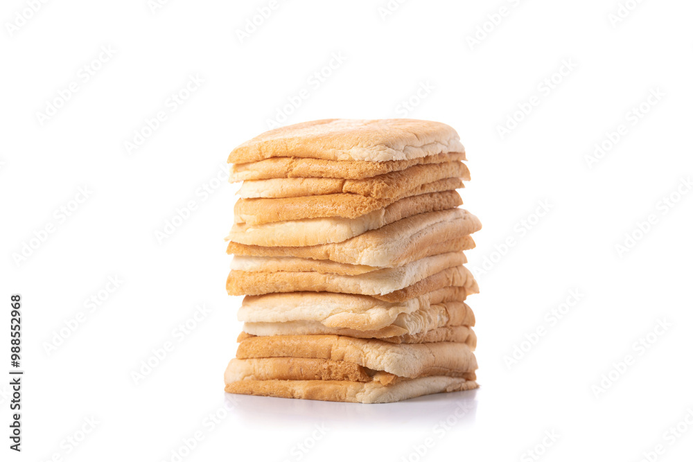 Slices of bread stacked on a gray wooden table against a isolated white background. The image symbolizes the connection between food, nutrition, and maintaining good health Slices of bread stacked on a gray wooden table against a isolated white background. The image symbolizes the connection between food, nutrition, and maintaining good health