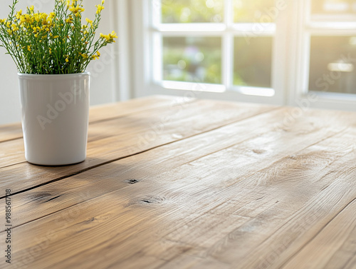 Empty dining table by kitchen counter