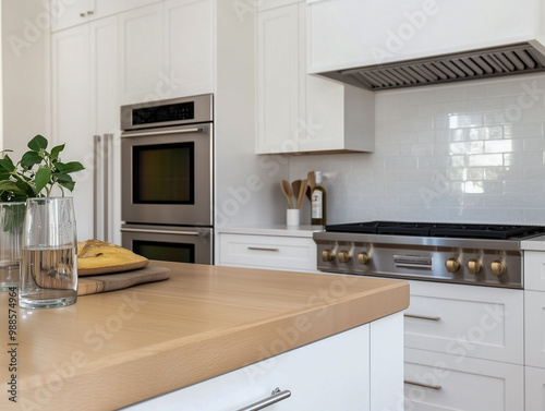 Interior design of modern kitchen with dining table and island