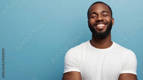 middle age man plus size smiling on blue shirt