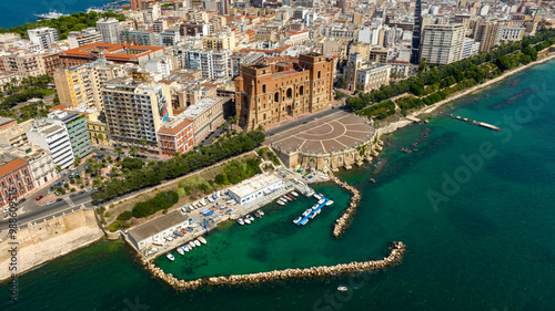 Aerial view of the Government Palace in Taranto, Puglia, Italy. It is the seat of the Prefecture and the provincial administration. The building overlooks the seafront and Marinai d'Italia roundabout. photo