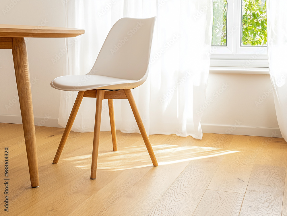 Fototapeta premium Minimalist dining room interior with round table and soft chairs