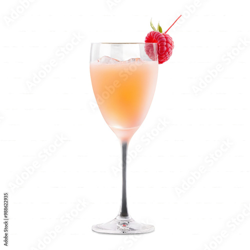 Bellini glass tall and slender containing a sparkling pale peach cocktail with a fresh raspberry