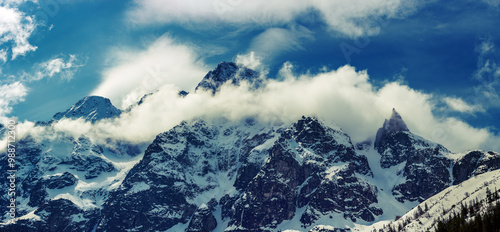 Fototapeta Naklejka Na Ścianę i Meble -  Mountain peaks near Morskie Oko or Sea Eye Lake in Poland at Winter. Tatras range
