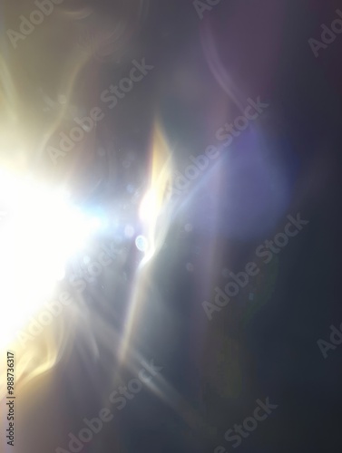 Light Leaks Overlay. Background with a smooth, blurred white light beam. The light reflections appears blurred and creates a sense of movement.