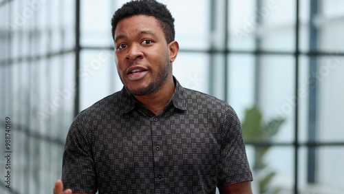 People and lifestyle. Indoor shot of a young confident black businessman looking serious