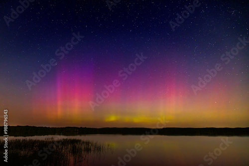 Obraz na płótnie Northern Lights (Aurora Borealis) lighting up the sky on a beautiful warm summer night near Ottawa, Canada Sept 12, 2024 w salonie