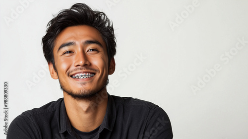 portrait of a man with braces