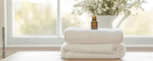 Warm towels infused with essential oils, ready for a spa-like experience at home   spa aromatherapy, essential oil-infused towels photo