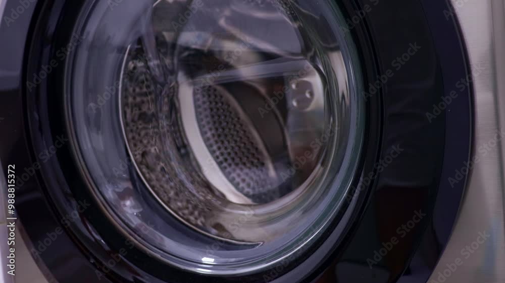Washing machine door closing close up Washing machine door closing close up