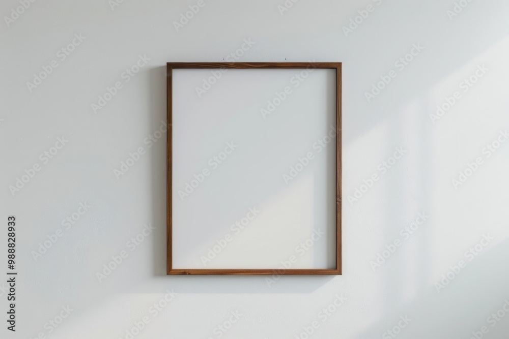 Empty wooden frame on wall Empty wooden frame on wall