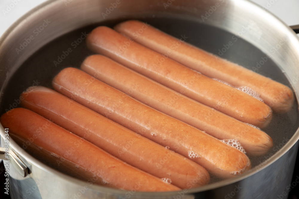 Homemade Boiled Hot Dogs in Water. Close-up. Homemade Boiled Hot Dogs in Water. Close-up.