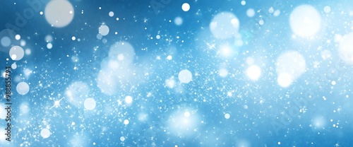 Bright blue background with shimmering bokeh effects created by light reflections on a sparkling surface