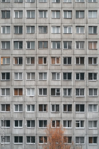 Facade of a Grey Multi-storey Panel building in Russia, Soviet architecture houses photo