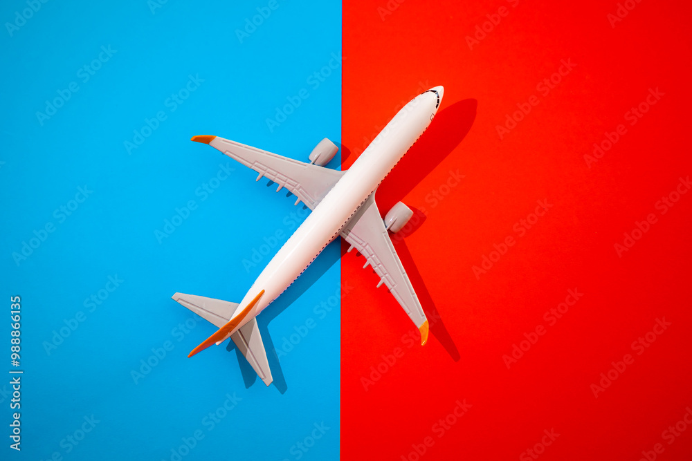 airplane on a red and blue background with top view, travel and flight concept airplane on a red and blue background with top view, travel and flight concept