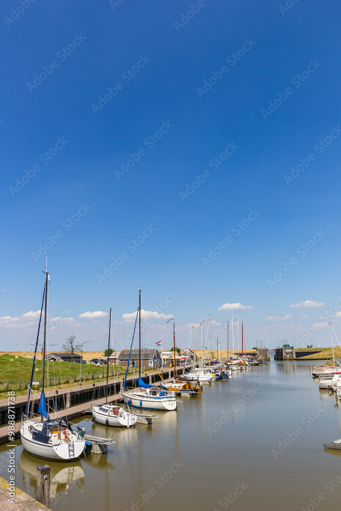 Sailing yachts in the harbor of Termunterzijl, Netherlands