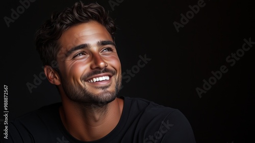 Portrait of a happy handsome man in a shirt with laughing