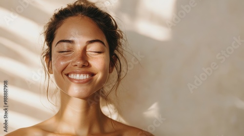 Woman with radiant skin smiling at the camera, showcasing the benefits of collagen for dry skin, with soft natural lighting, 4k quality.