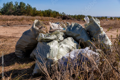 World Cleanup Day - Karaganda, Kazakhstan - September 21, 2024. : Ecological action. Cleaning the planet. Many bags of collected garbage. Without people photo